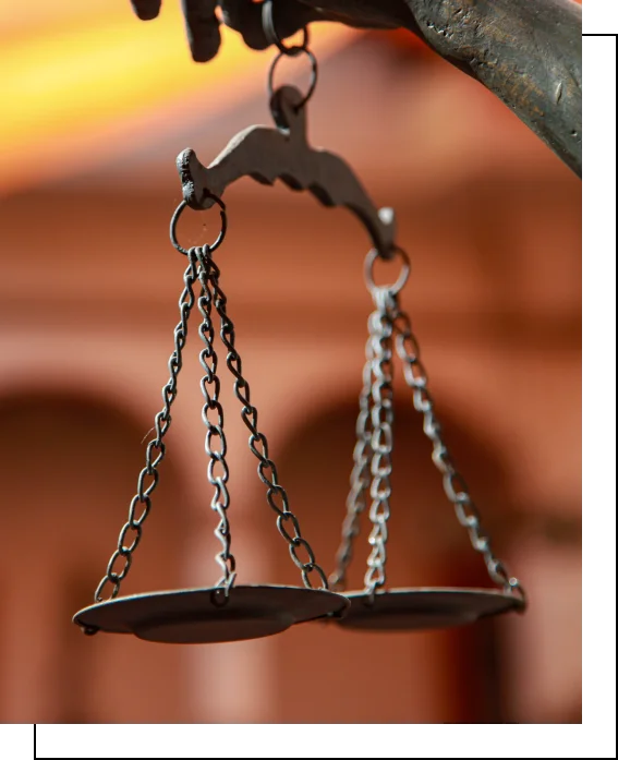 Scales of justice representing legal balance and fair representation at Bery Law